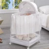 Delta Children Gliding Bassinet