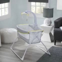 Delta Children Deluxe Activity Sleeper Bassinet