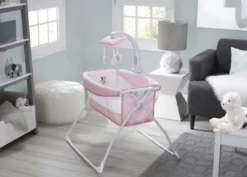 Delta Children Deluxe Activity Sleeper Bassinet