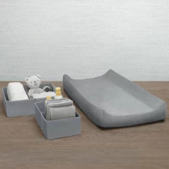 Delta Children Changing Pads & Covers 7-Piece Essential Changing Table Set - Newborn Baby Gift Set For Boys And Girls – Set Includes Changing Pad, Plush Changing Pad Cover, 3 Changing Pad Liners And 2 Storage Bins