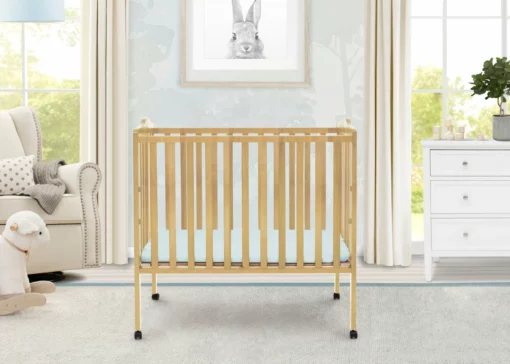 Delta Children Folding Portable Mini Baby Crib With 1.5-inch Mattress Baby Cribs 2 Delta Children Folding Portable Mini Baby Crib With 1.5-inch Mattress Baby Cribs